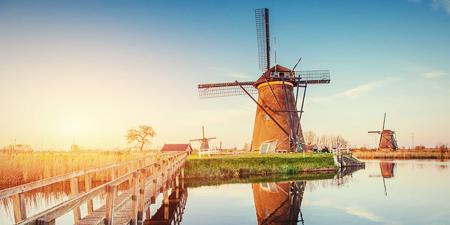 Windmill on canal Holland