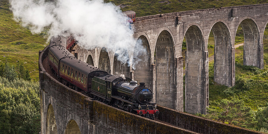 Steam train on viaduct