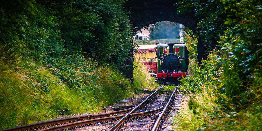 Train coming through tunnel